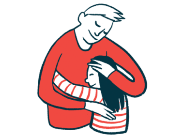 An adult and child embrace.