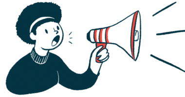 A woman uses a megaphone to make an announcement.