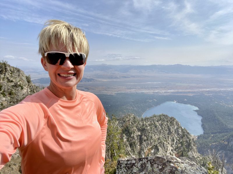 run for Batten disease | Batten Disease News | Columnist Laura King Edwards takes a selfie picture standing atop Death Canyon during the Jackson Hole Half Marathon race.
