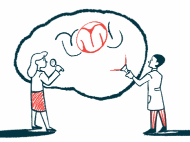 A researcher shines a flashlight to create a giant image of the brain, which another scientist looks at with a magnifying glass.