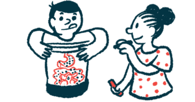 A child holds up his shirt while another child draws bacteria shapes on his stomach.